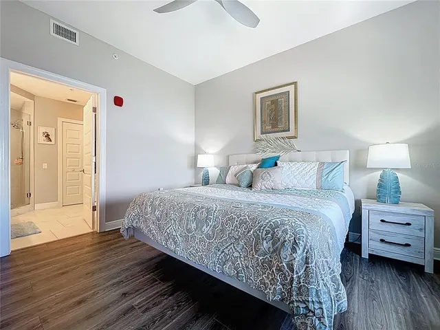 a bedroom with bed and window