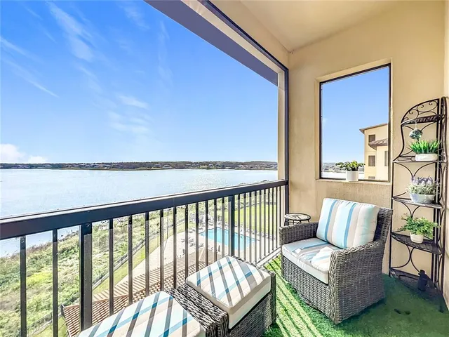 a balcony with furniture