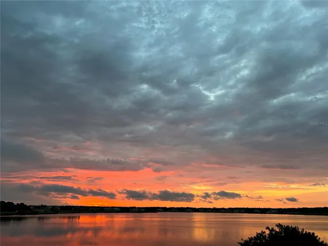 a view of lake and mountain
