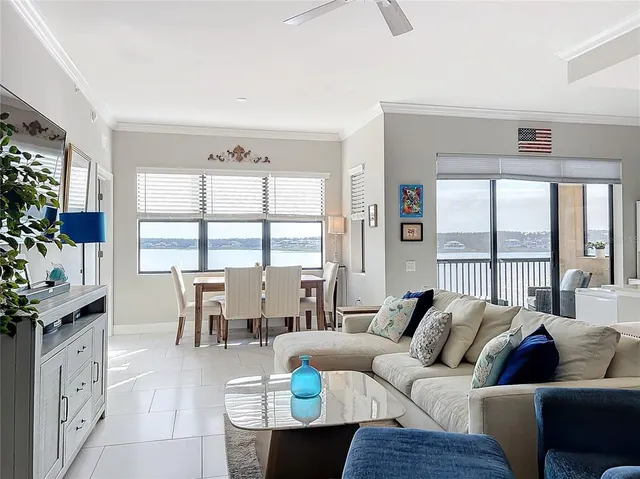 a living room with furniture and flat screen tv