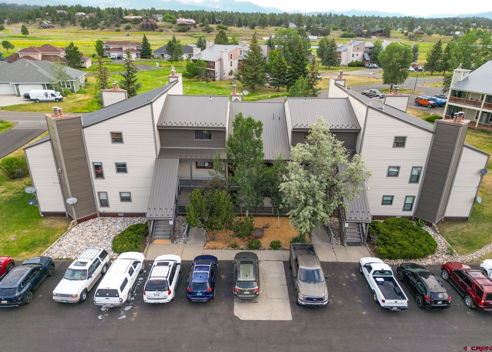a view of a chairs and table in a patio