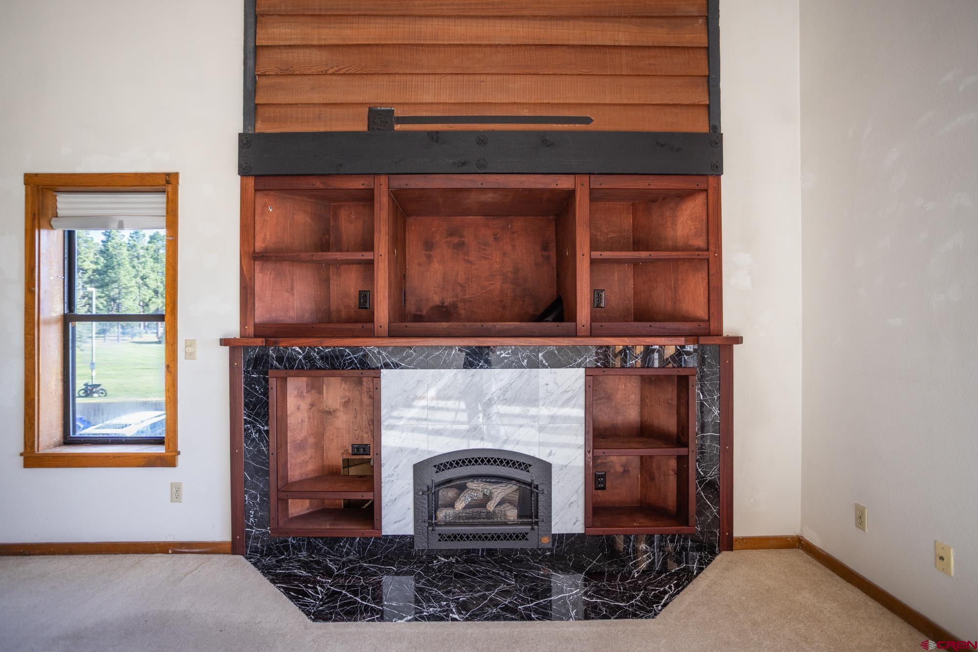 164 Valley View Drive, Unit 3218 Pagosa Springs, CO 81147 - Photo 17 of 39 a living room with a fireplace