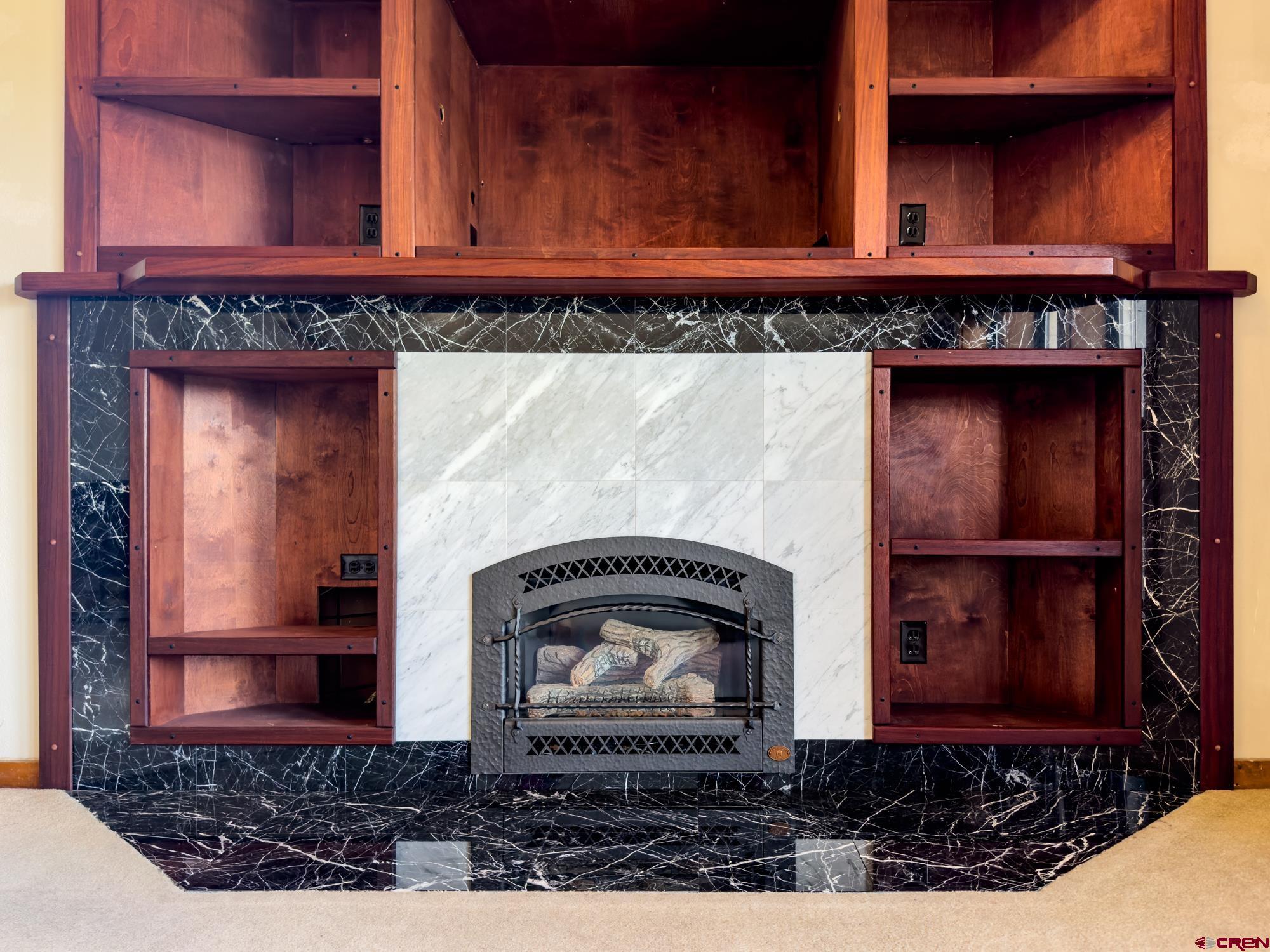 164 Valley View Drive, Unit 3218 Pagosa Springs, CO 81147 - Photo 18 of 39 a front view of a house with a garden