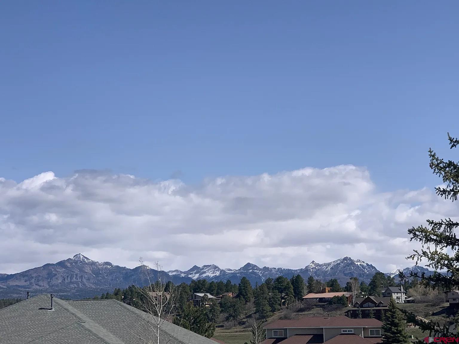 164 Valley View Drive, Unit 3218 Pagosa Springs, CO 81147 - Photo 31 of 39 an aerial view of residential house with green space and mountain view
