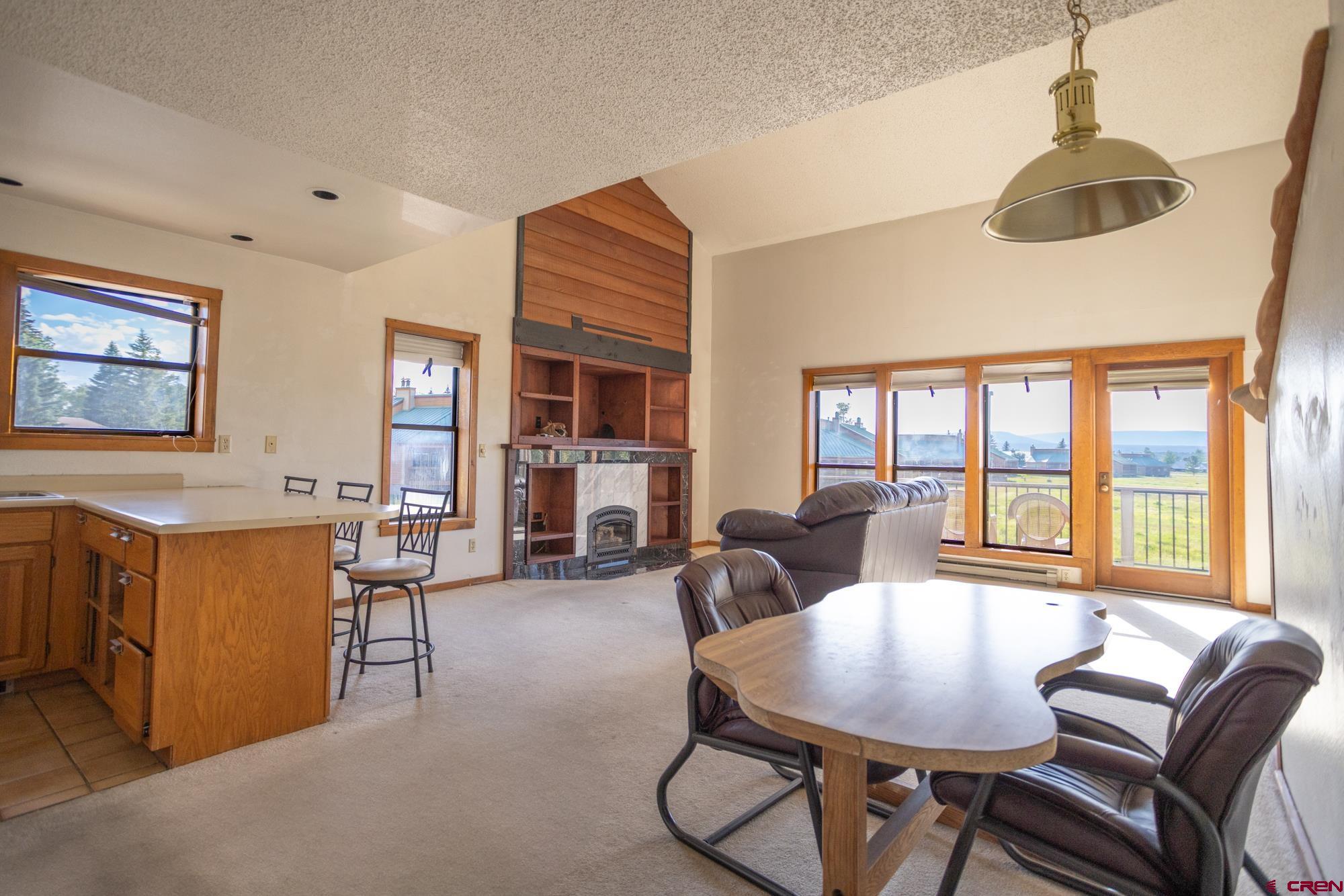164 Valley View Drive, Unit 3218 Pagosa Springs, CO 81147 - Photo 6 of 39 a view of a livingroom and dining room