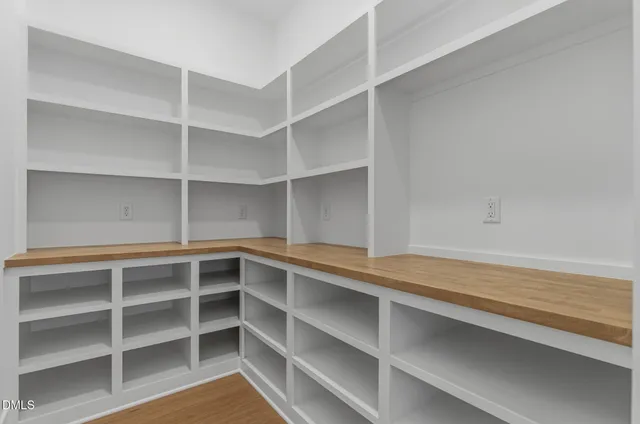 a bathroom with a shower and toilet