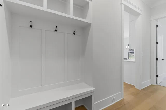 a view of empty room with a ceiling fan