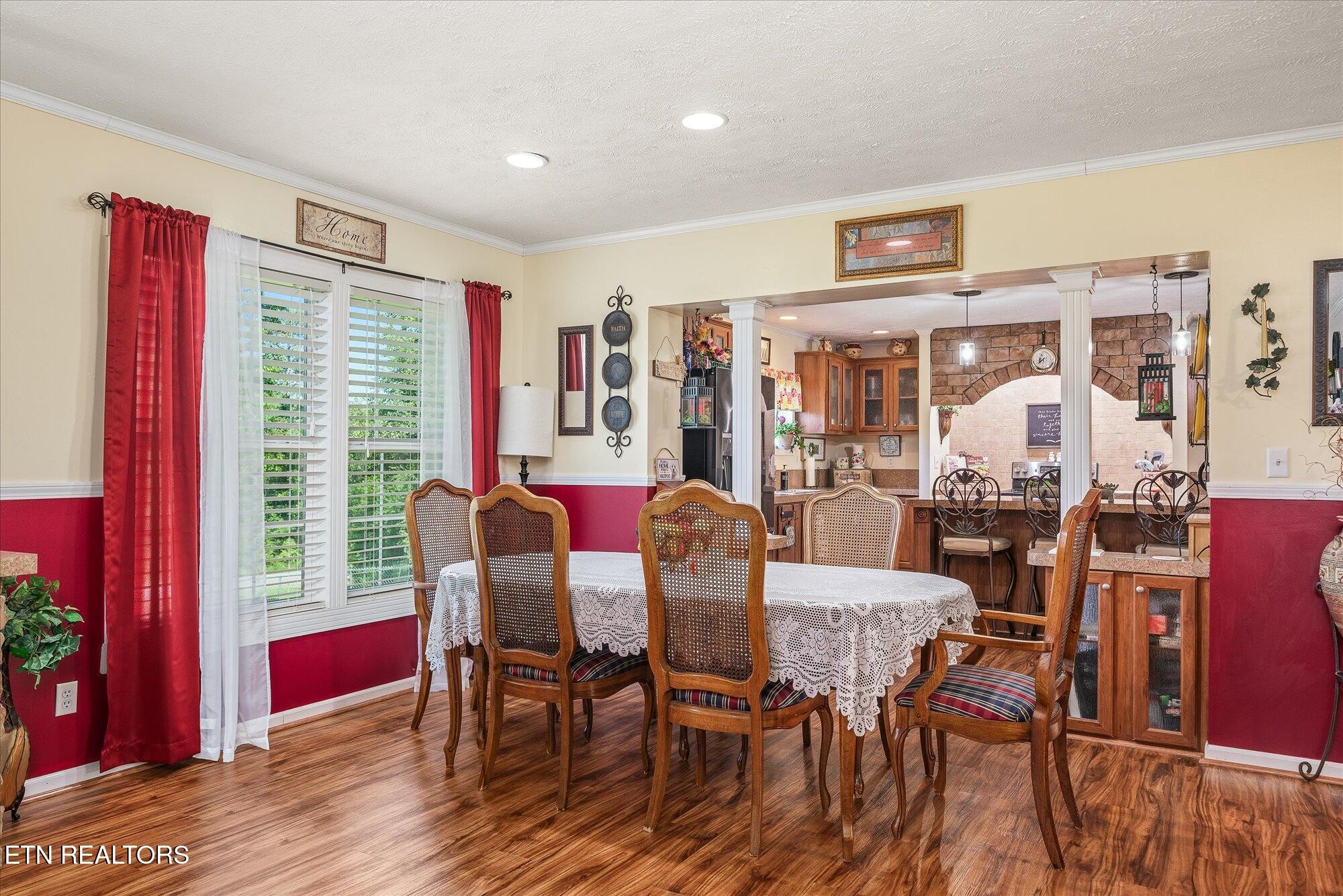 20292025 Shiloh Road Decatur, TN 37322 - Photo 30 of 60 a view of a dining room with furniture window and wooden floor