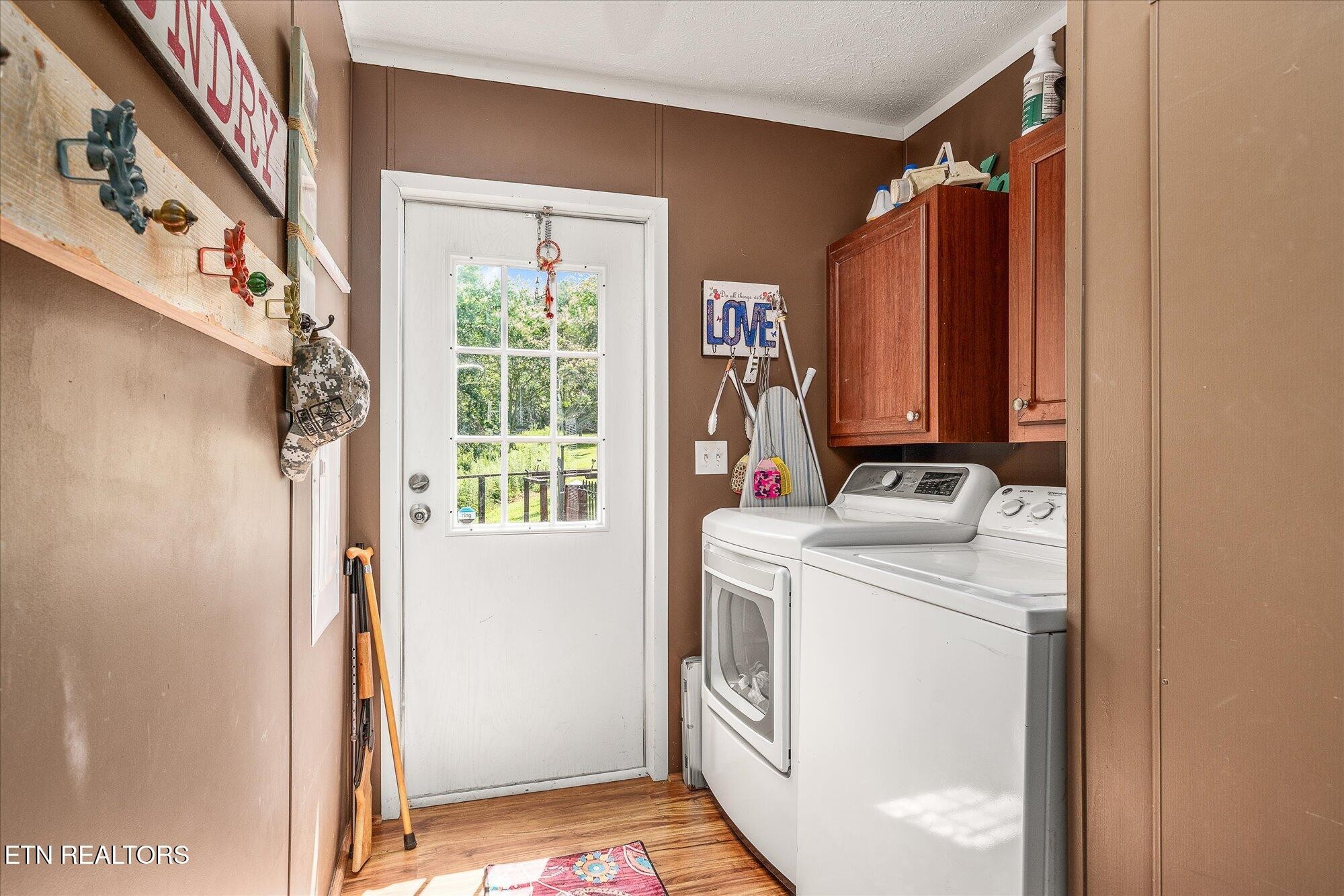 20292025 Shiloh Road Decatur, TN 37322 - Photo 45 of 60 a view of storage and utility room with washer and dryer