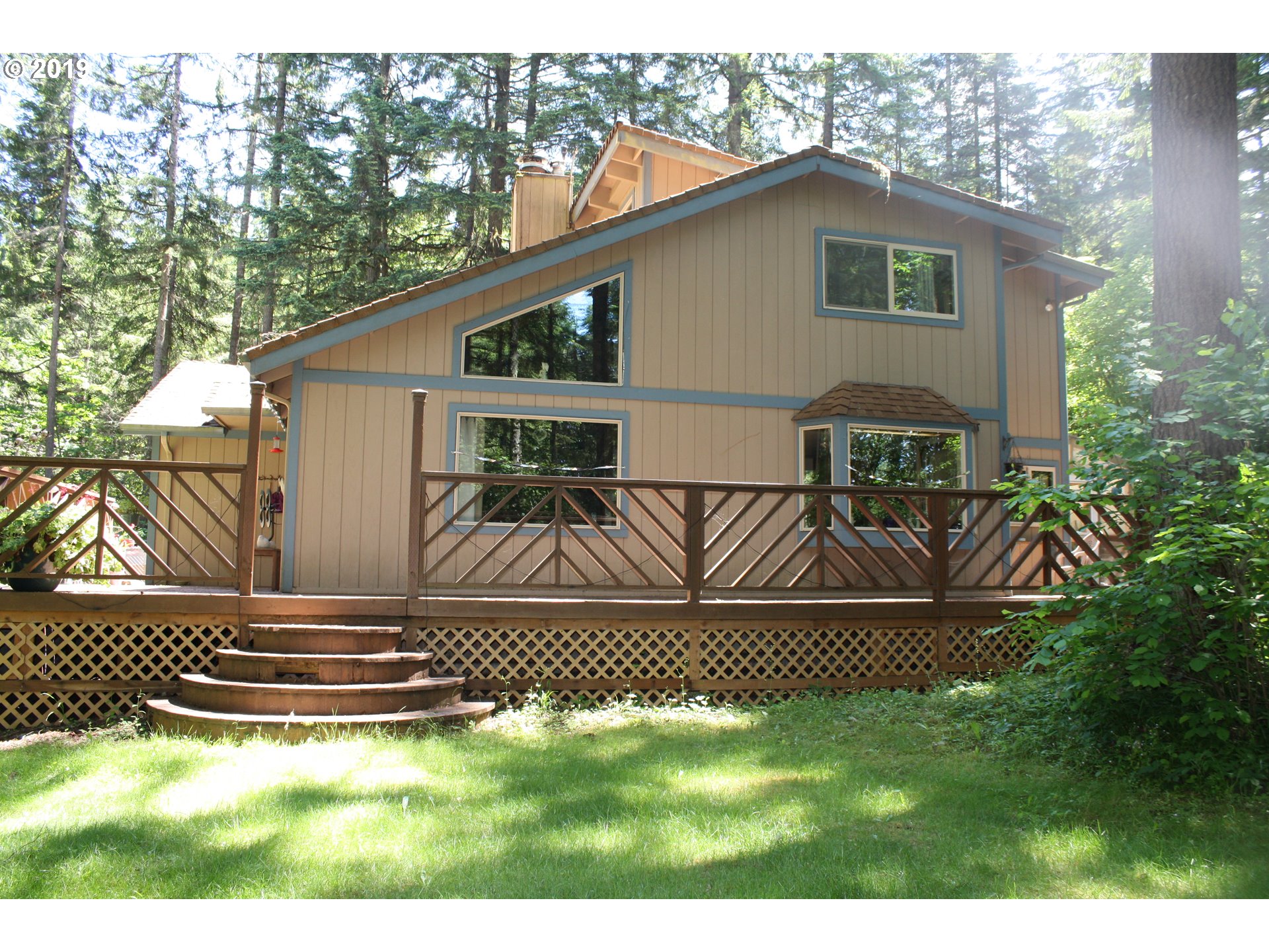 37754 Wallace Creek Road Springfield, OR 97478 - Photo 3 of 23 a view of a house with a yard