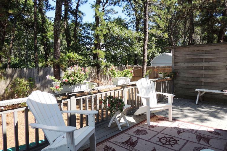 23 Shore Rd Extension West Harwich, MA 02671 - Photo 16 of 24 a view of balcony with wooden floor and outdoor seating