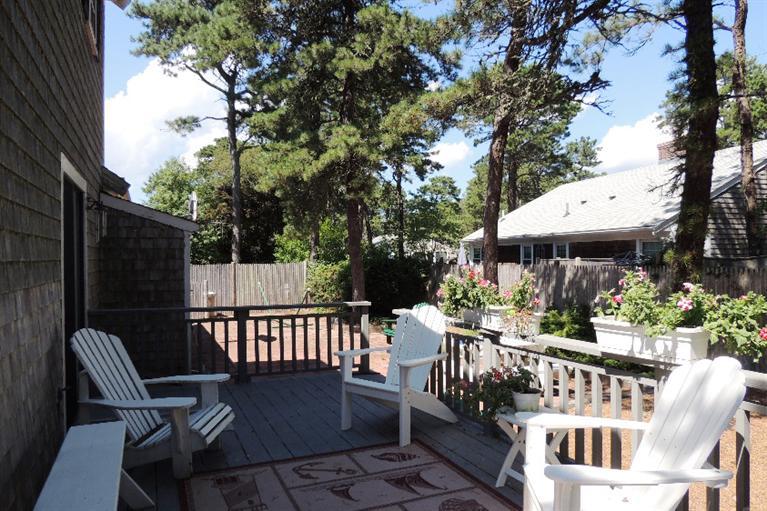 23 Shore Rd Extension West Harwich, MA 02671 - Photo 17 of 24 a view of a chairs and table in the patio