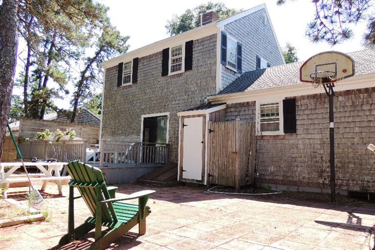 23 Shore Rd Extension West Harwich, MA 02671 - Photo 18 of 24 a front view of a house with patio