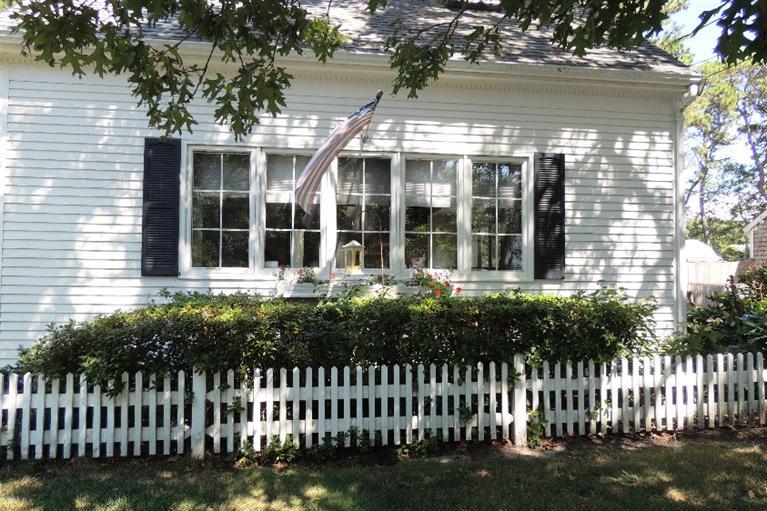 23 Shore Rd Extension West Harwich, MA 02671 - Photo 20 of 24 a house view with a garden space