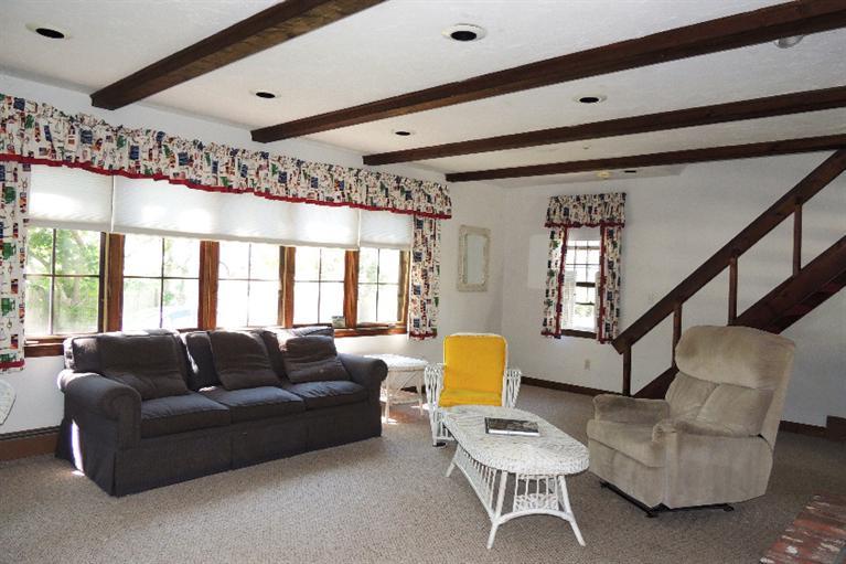 23 Shore Rd Extension West Harwich, MA 02671 - Photo 2 of 24 a living room with furniture and a large window