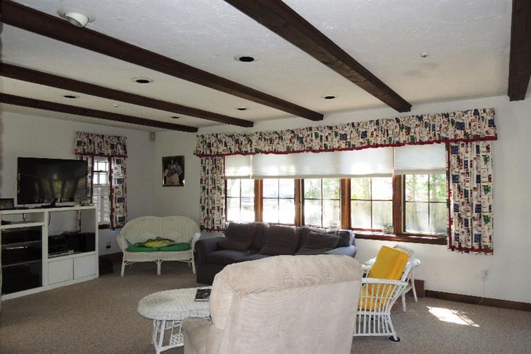 23 Shore Rd Extension West Harwich, MA 02671 - Photo 3 of 24 a living room with furniture and a flat screen tv
