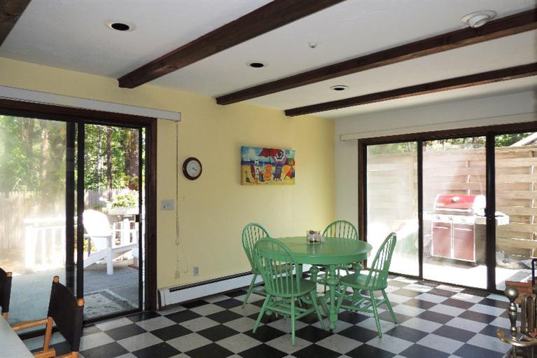 23 Shore Rd Extension West Harwich, MA 02671 - Photo 8 of 24 a view of a dining room with furniture window and outside view