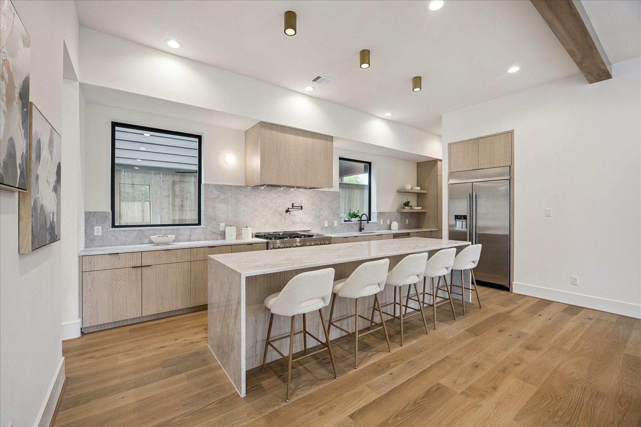 122 East 4th Street Houston, TX 77007 - Photo 11 of 38 Kitchen - wide plank wood flooring and designer lighting.