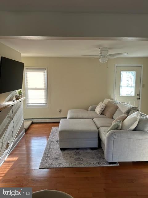19 North Maple Avenue Maple Shade, NJ 08052 - Photo 5 of 26 a living room with a bed furniture and a flat screen tv