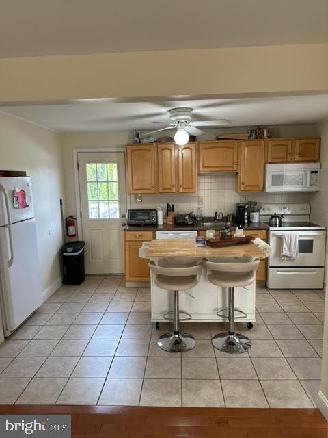 19 North Maple Avenue Maple Shade, NJ 08052 - Photo 10 of 26 a kitchen with a sink and a stove top oven