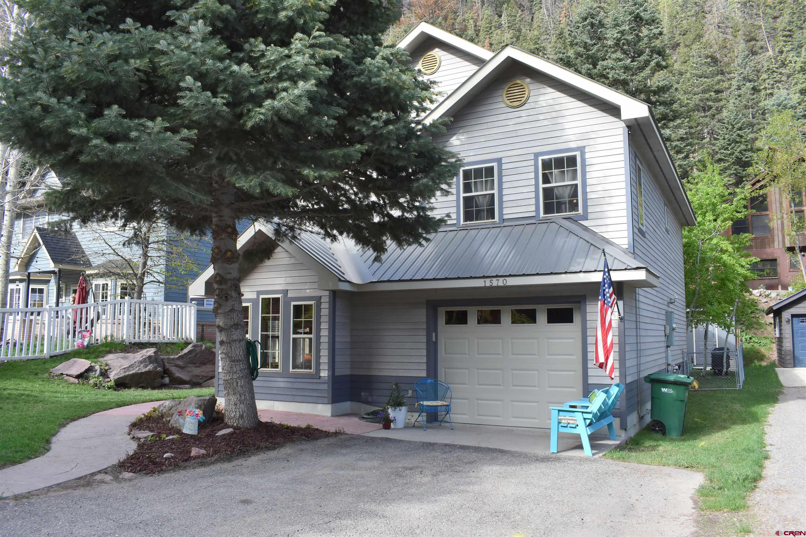 1570 Oak Street Ouray, CO 81427 - Photo 1 of 35 front view of a house with a yard