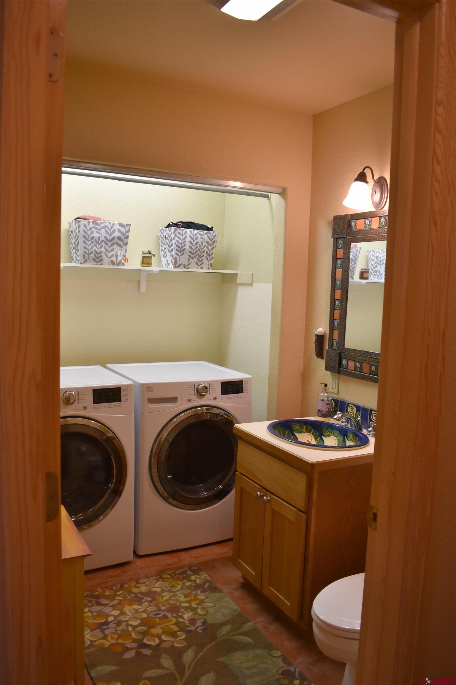 1570 Oak Street Ouray, CO 81427 - Photo 20 of 35 a bathroom with a sink and a mirror