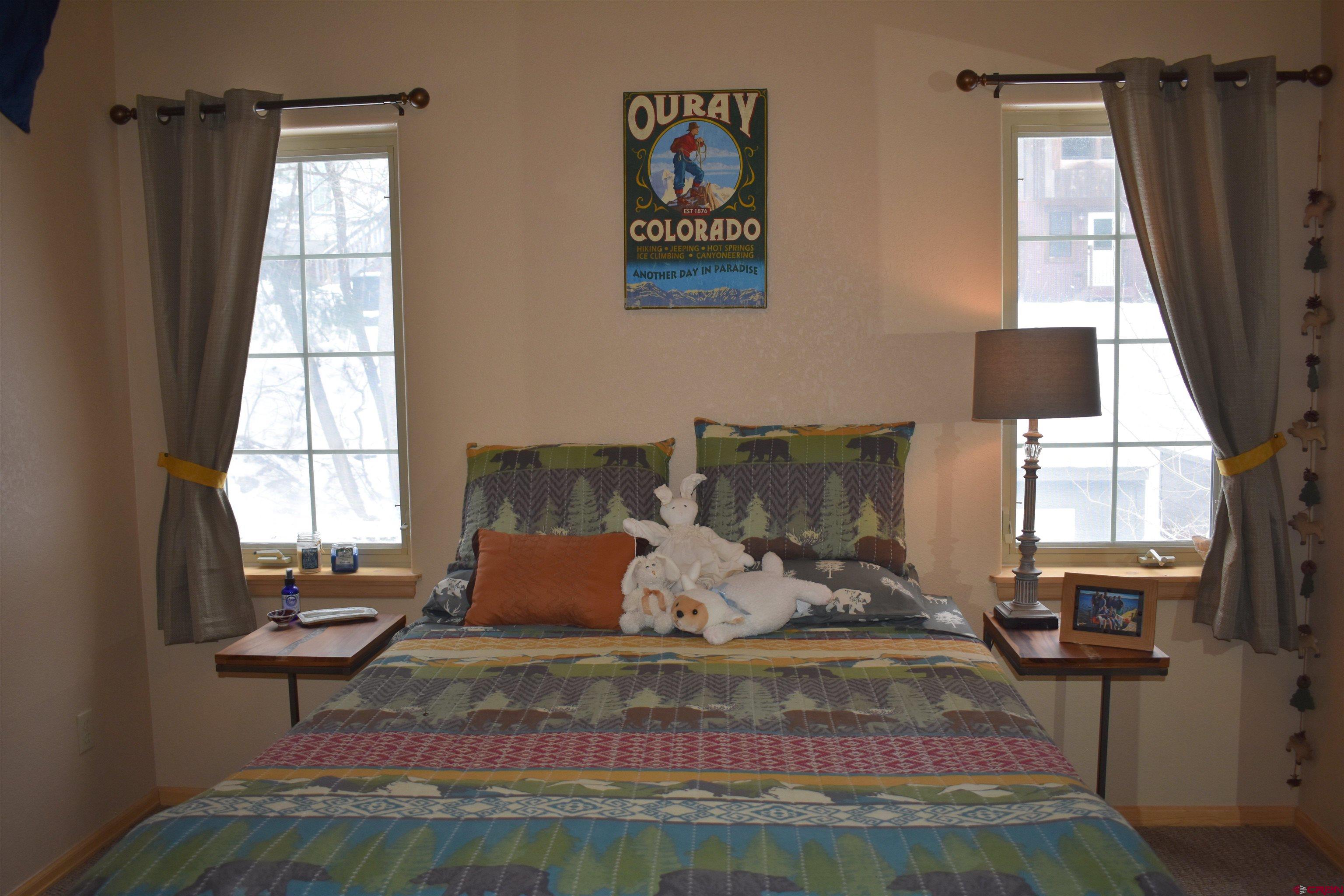 1570 Oak Street Ouray, CO 81427 - Photo 25 of 35 a living room with furniture and a window