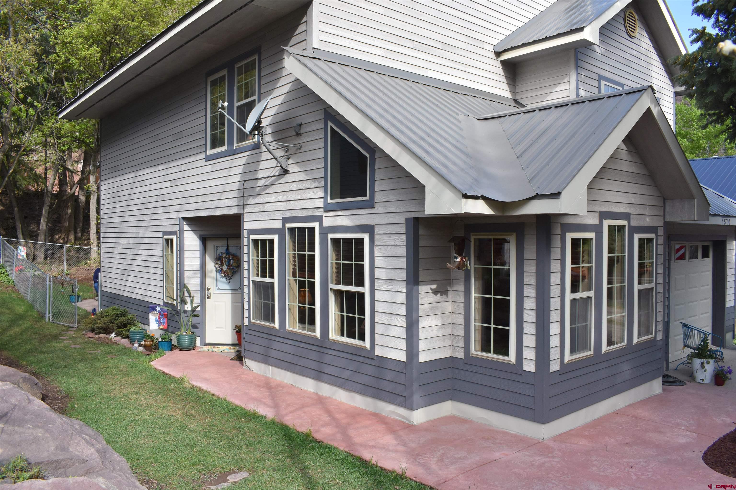 1570 Oak Street Ouray, CO 81427 - Photo 4 of 35 a view of a house with yard and deck