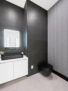 a view of entryway and hall with a front door