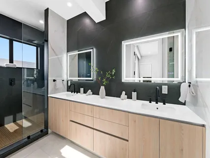 a utility room with a shower and dryer