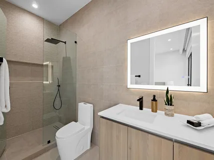 a bathroom with a shower and a window