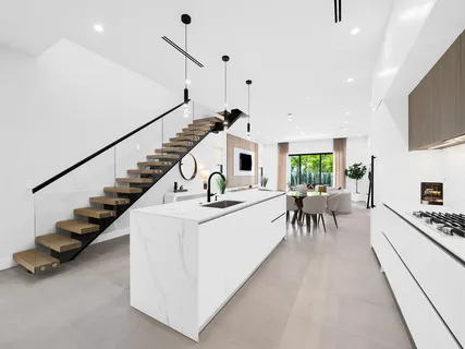 a living room with furniture oven and a table