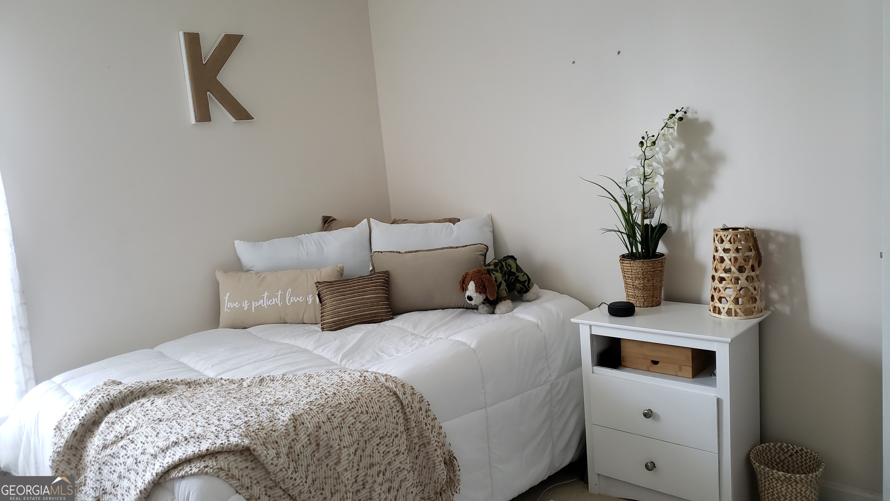 533 Edgewood Drive Athens, GA 30606 - Photo 13 of 20 a bedroom with a bed and a potted plant on dresser