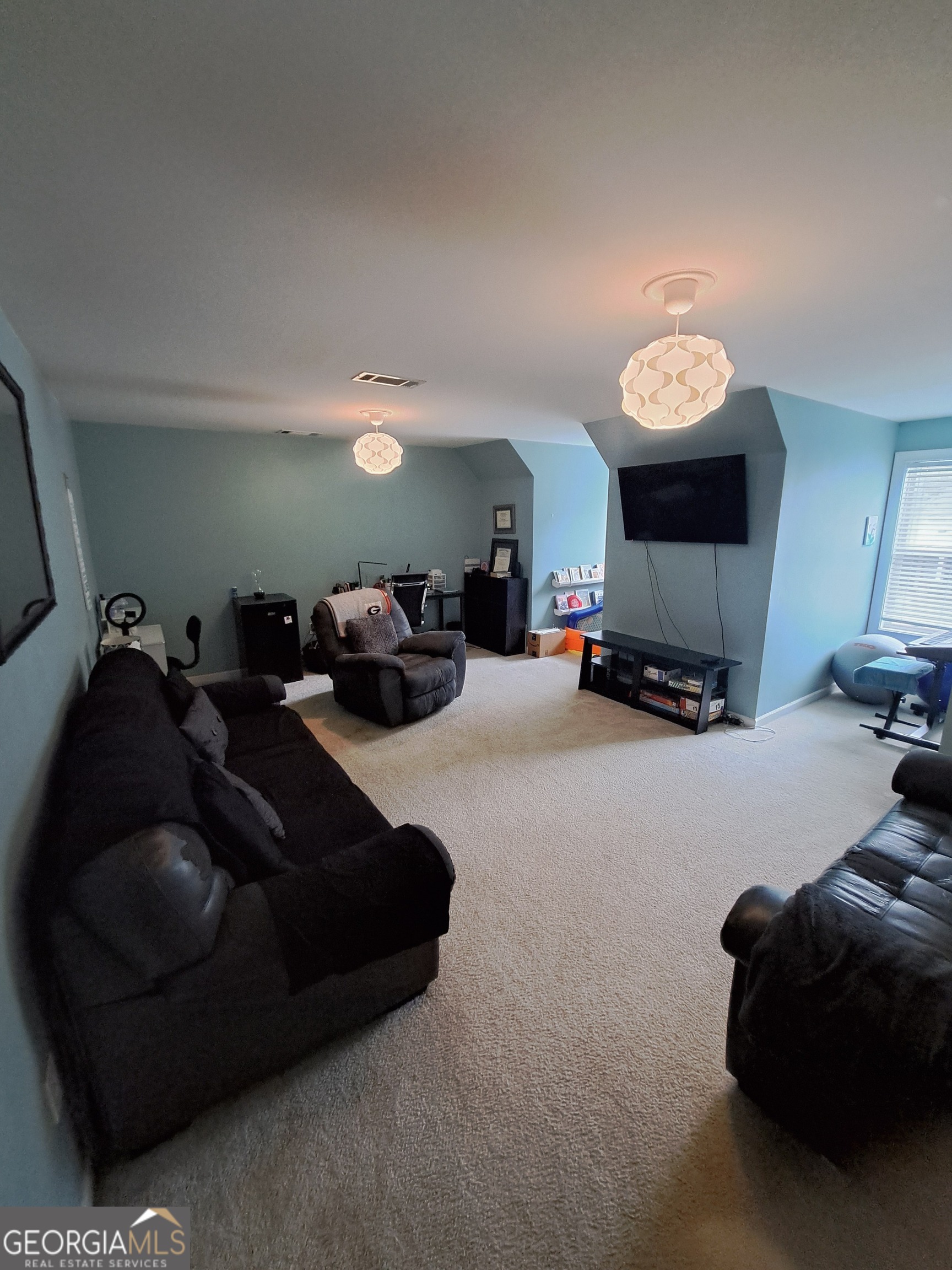 533 Edgewood Drive Athens, GA 30606 - Photo 17 of 20 a living room with furniture and a mirror