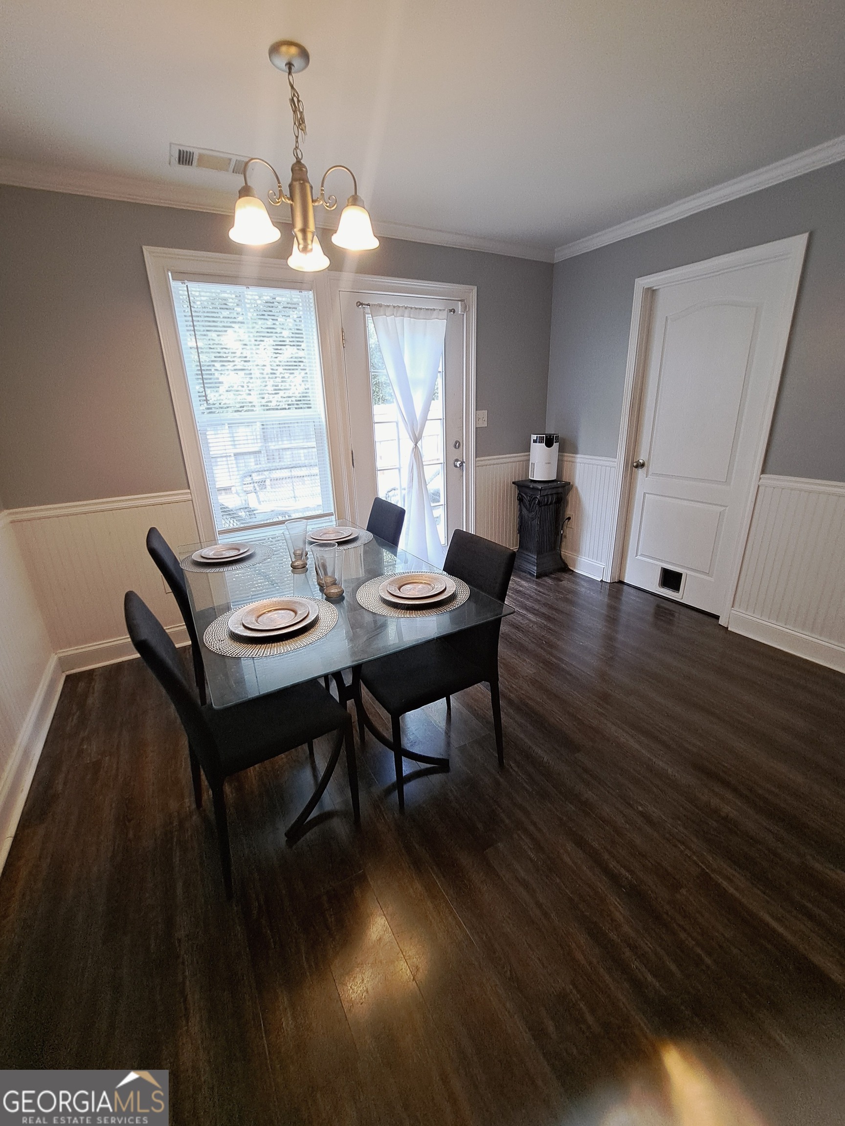 533 Edgewood Drive Athens, GA 30606 - Photo 7 of 20 a view of a dining room with furniture window and wooden floor