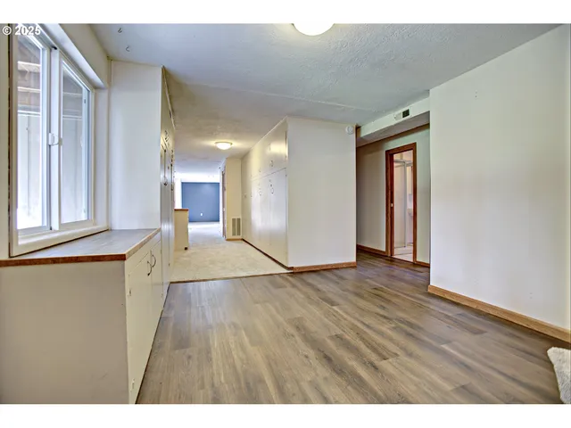 a view interior of a house wooden floor and windows