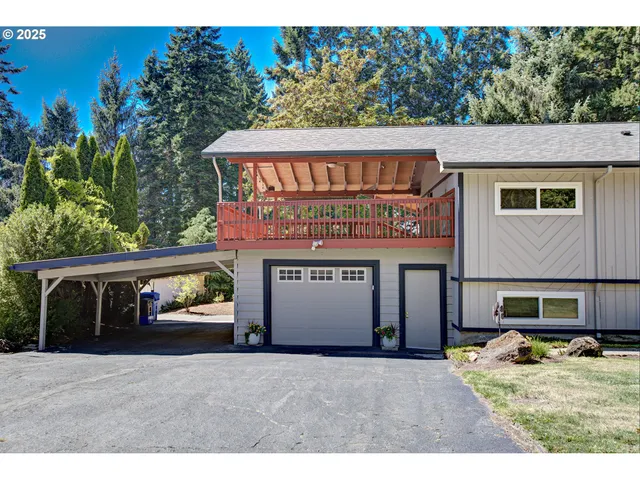 a view of a car park in front of house