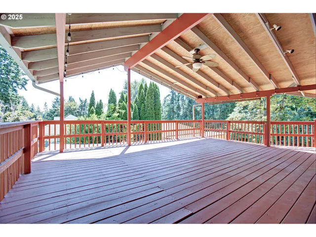 a view of outdoor space with wooden floor