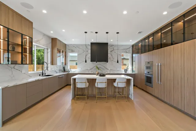 a view of living room with furniture and painting on the wall
