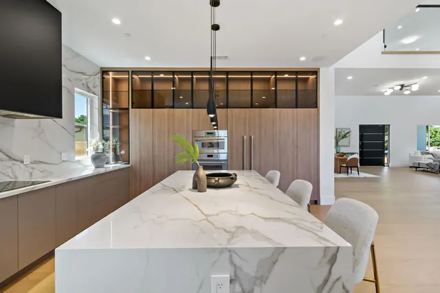 a bedroom with a bed and a walk in closet