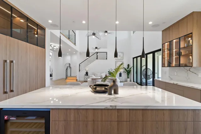a living room with a table and a window