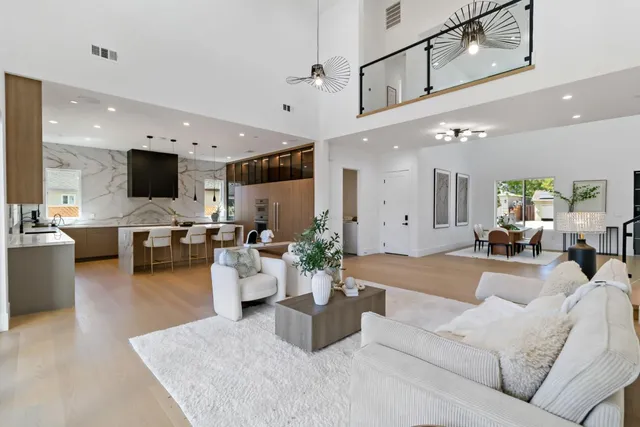 a lobby with furniture and floor to ceiling window