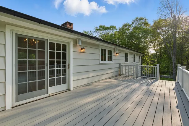a view of a house with a large window