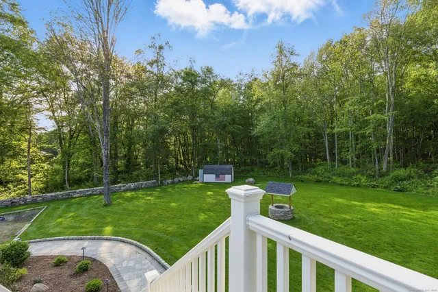 a view of a park with large trees