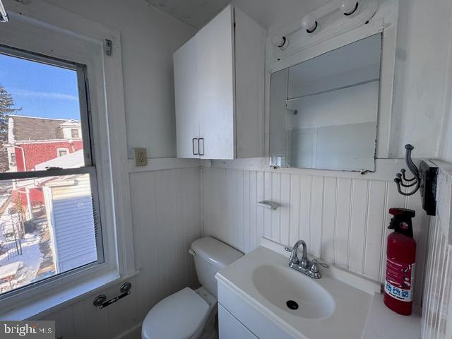 414 May Street Pottstown, PA 19464 - Photo 15 of 20 a bathroom with a sink mirror and toilet