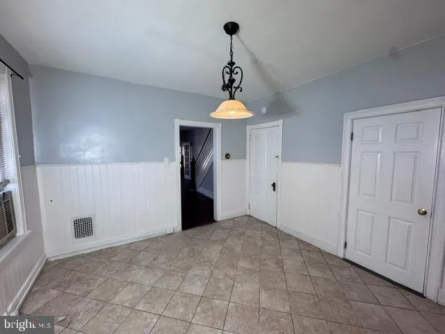 a bathroom with a sink toilet and vanity
