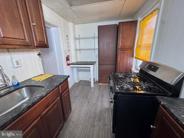 414 May Street Pottstown, PA 19464 - Photo 7 of 20 a kitchen with stainless steel appliances granite countertop a sink stove and refrigerator