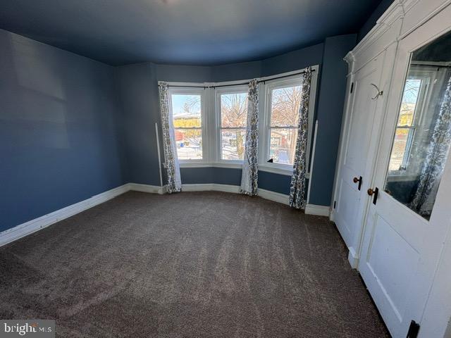 414 May Street Pottstown, PA 19464 - Photo 10 of 20 an empty room with a fireplace