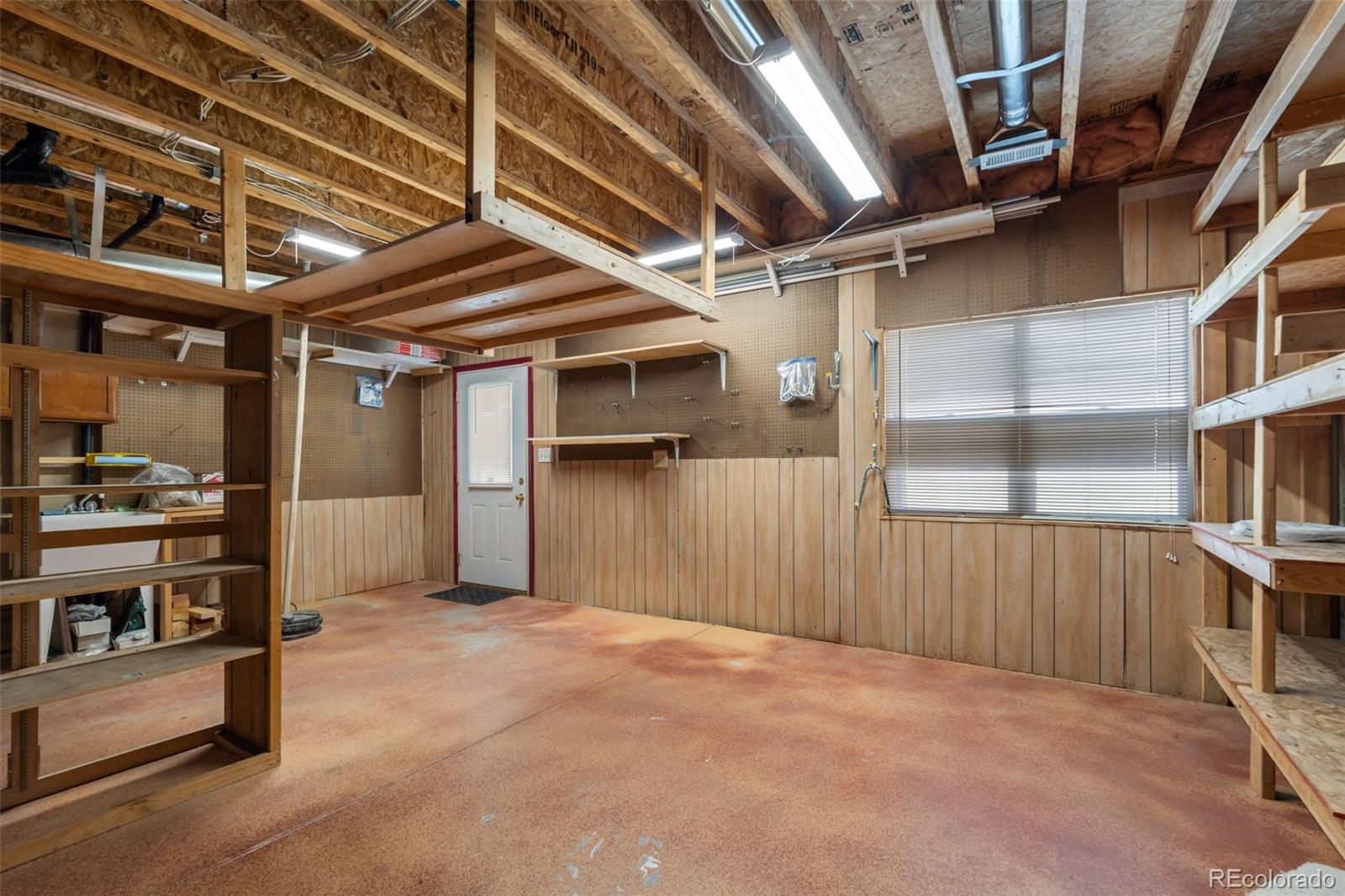 11424 McKissick Road Peyton, CO 80831 - Photo 26 of 32 a view of an empty room with furniture