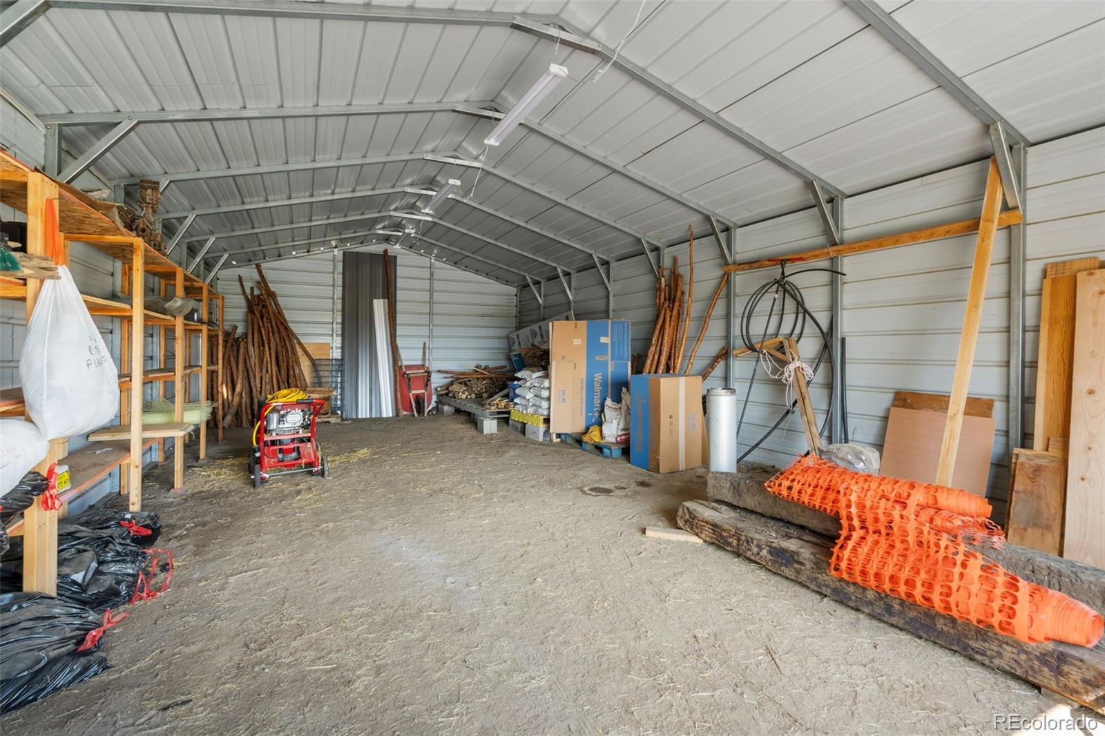 11424 McKissick Road Peyton, CO 80831 - Photo 31 of 32 a view of storage and utility room